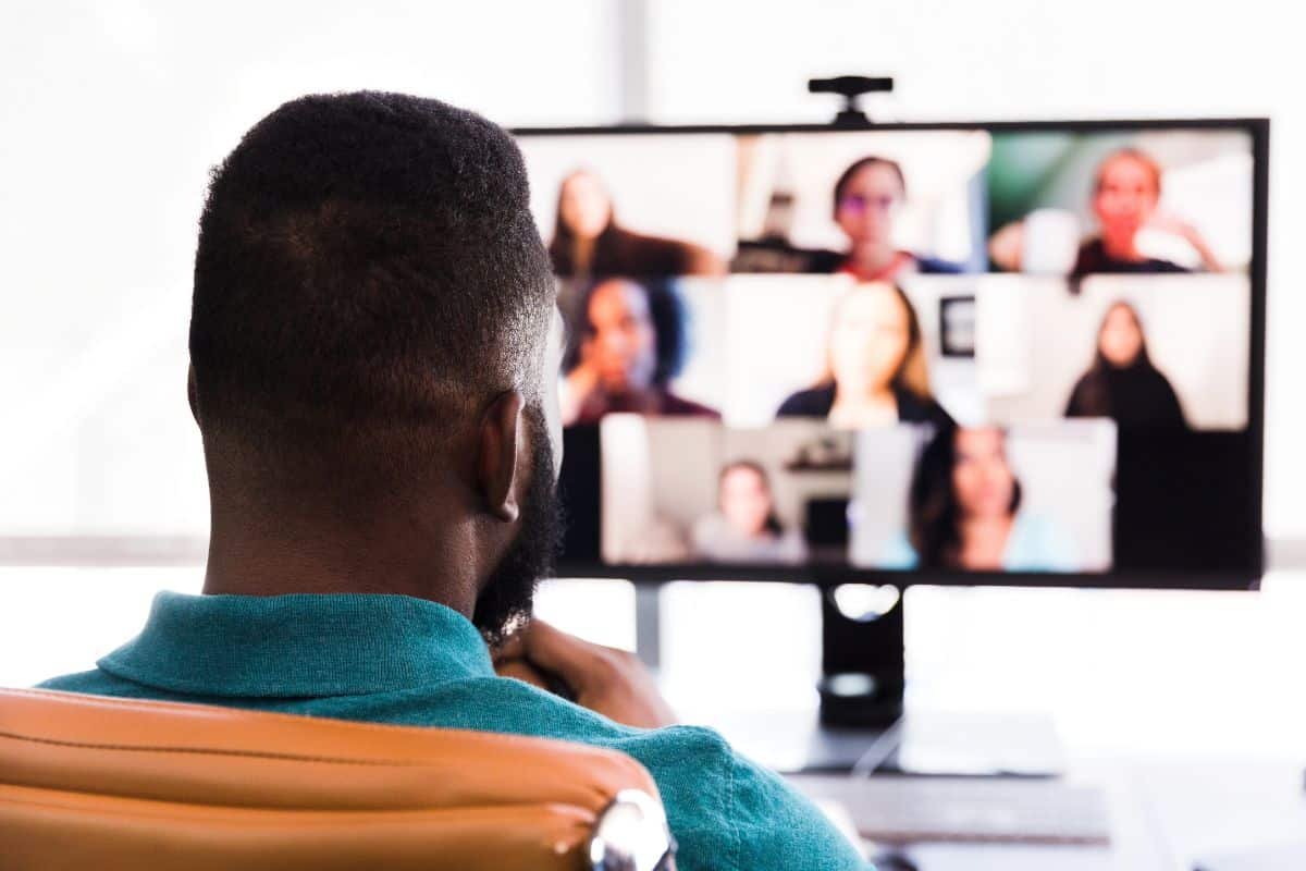 A man in a virtual meeting