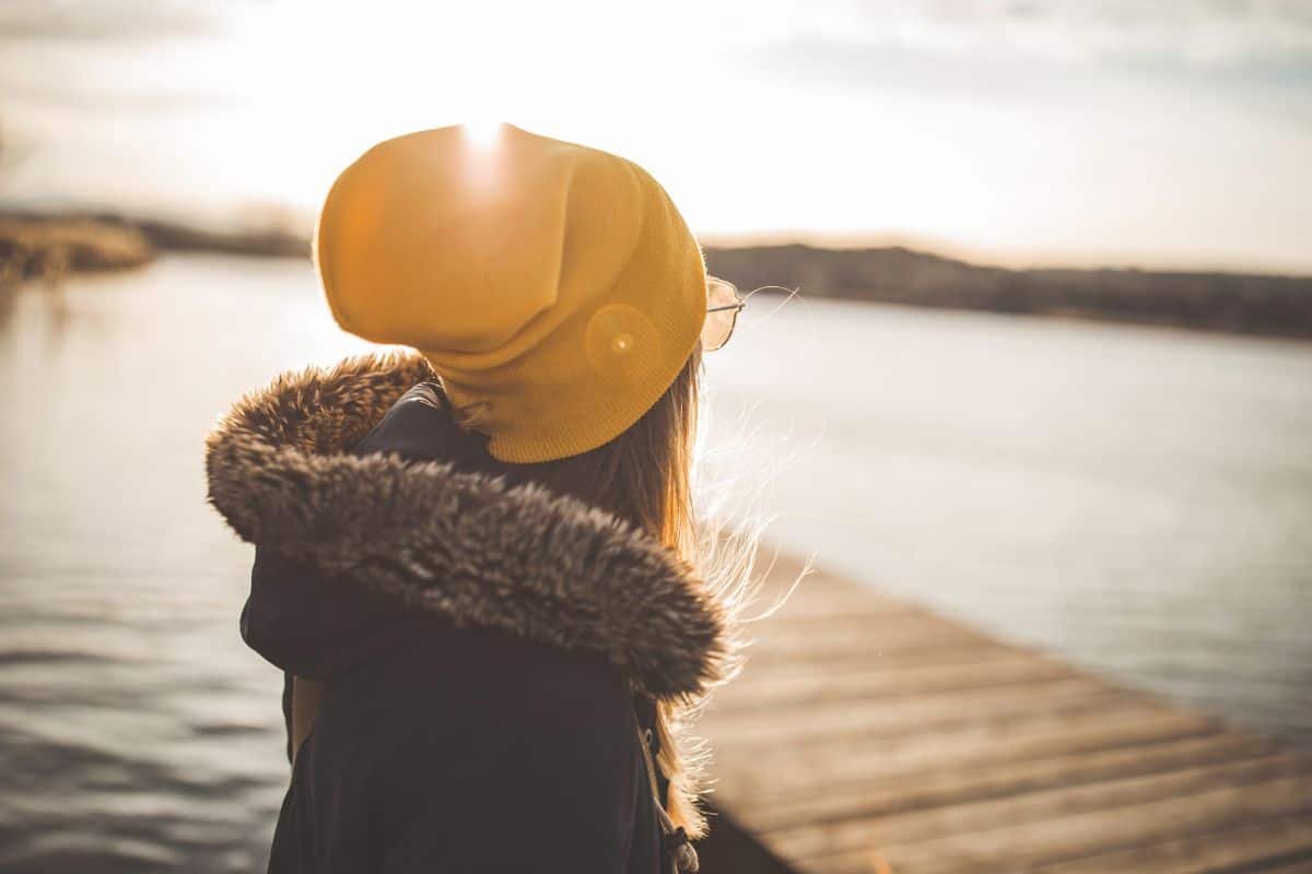 a woman at a lake